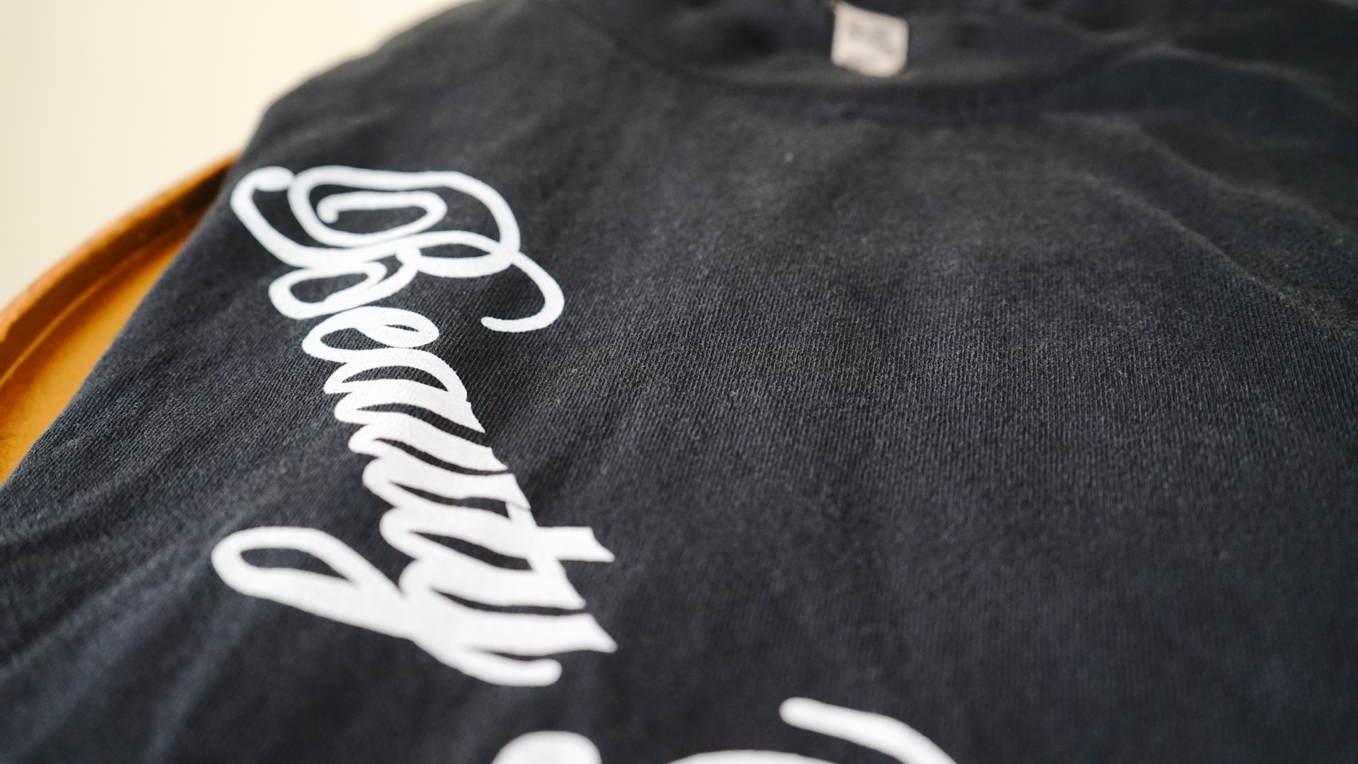 "Beauty Through Pain" Capped Tank in Carbon Black